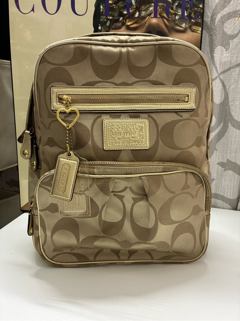 Coach Poppy Tan Signature Backpack